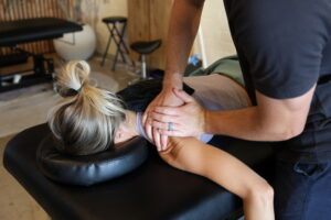physical therapist working on a shoulder