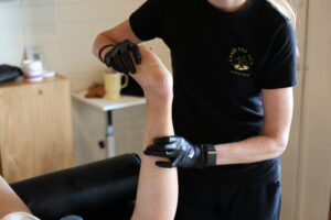 physical therapist working on a foot