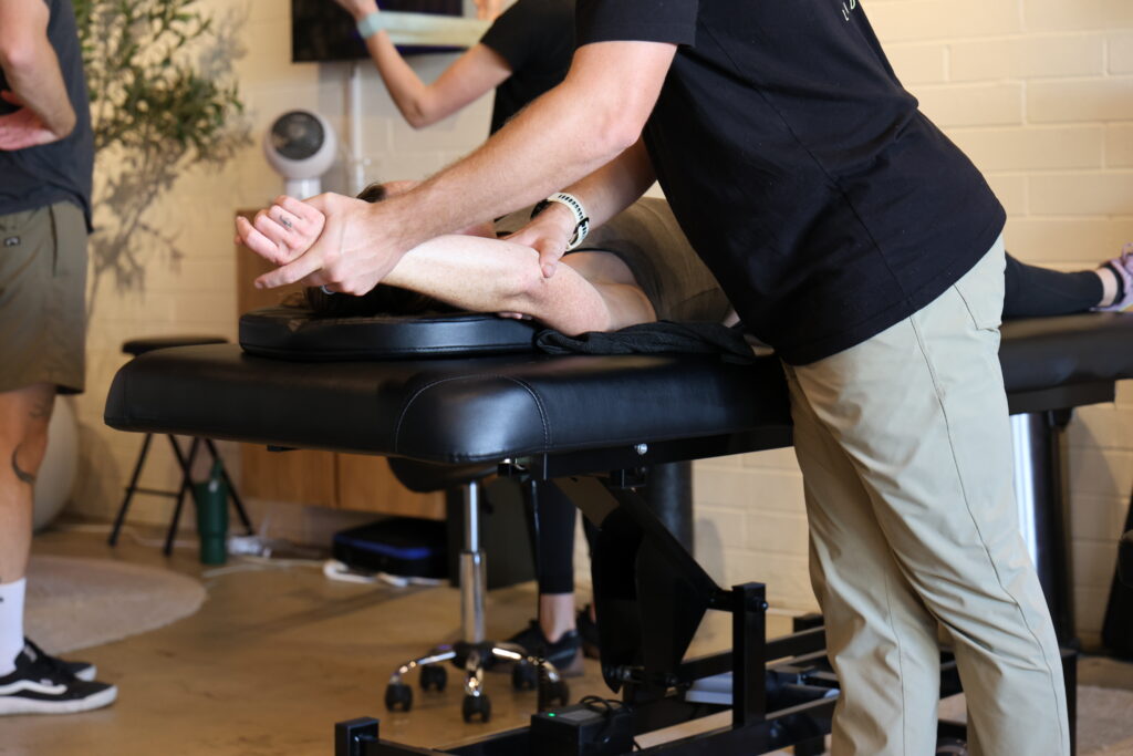 physical therapist working on elbow