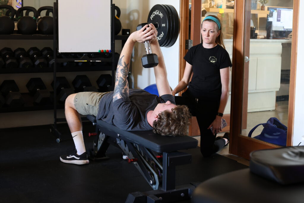 pt client holding weight